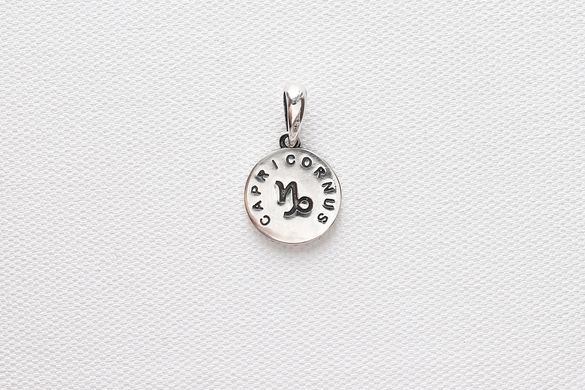 Women's silver pendant "Capricornus"
