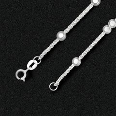 Женская серебряная цепочка с шариками