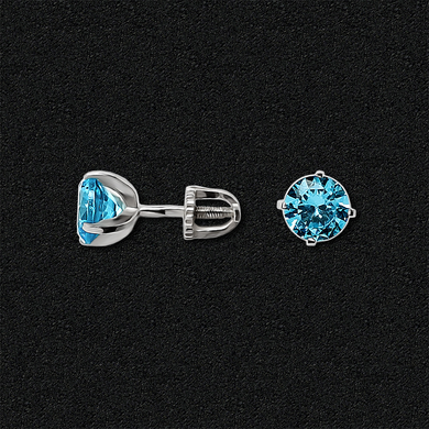 Silver stud earrings with sky blue topaz
