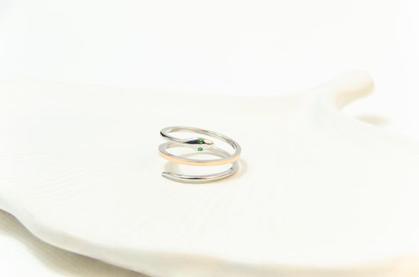 Silver ring "Snake" with green cubic zirconia