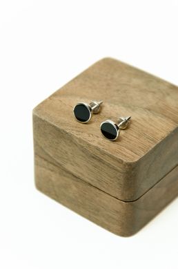 Silver stud earrings with black enamel